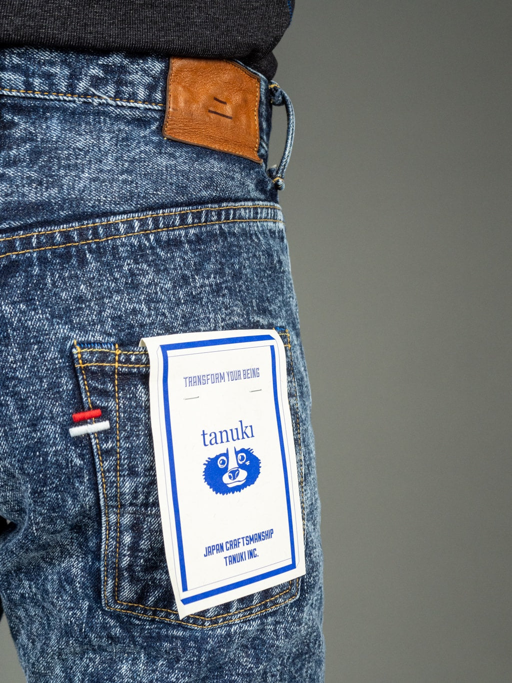 Tanuki Natural Acid Wash High Tapered Jeans Back Pocket