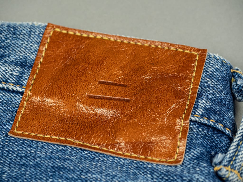 Tanuki Yurai Stonewash High Tapered Jeans Leather Patch
