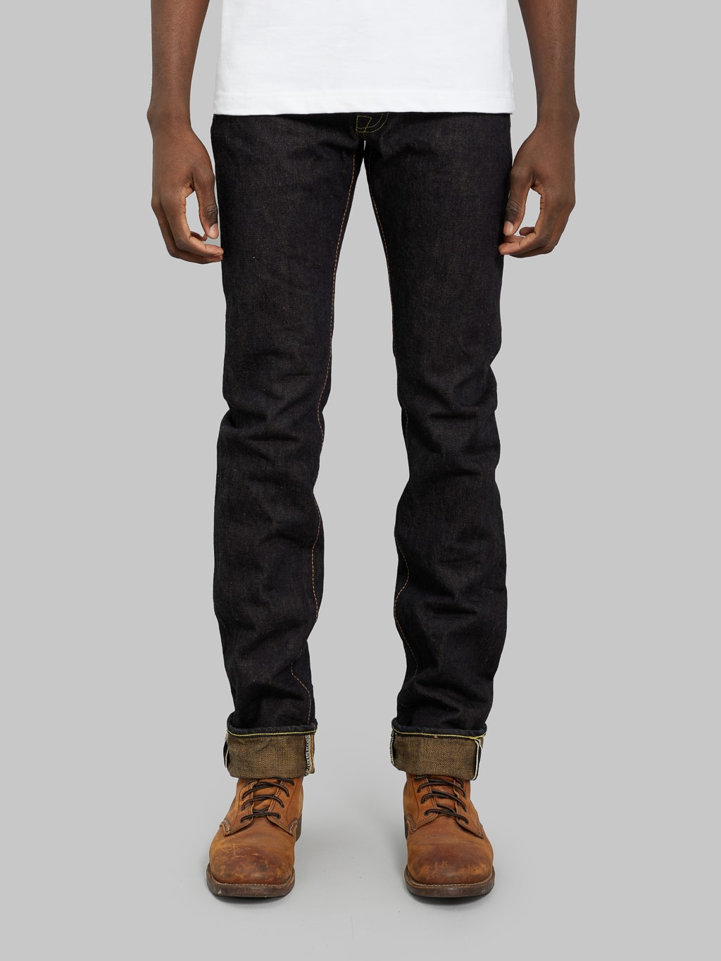 The Strike Gold Brown Weft Slim Jeans front fit