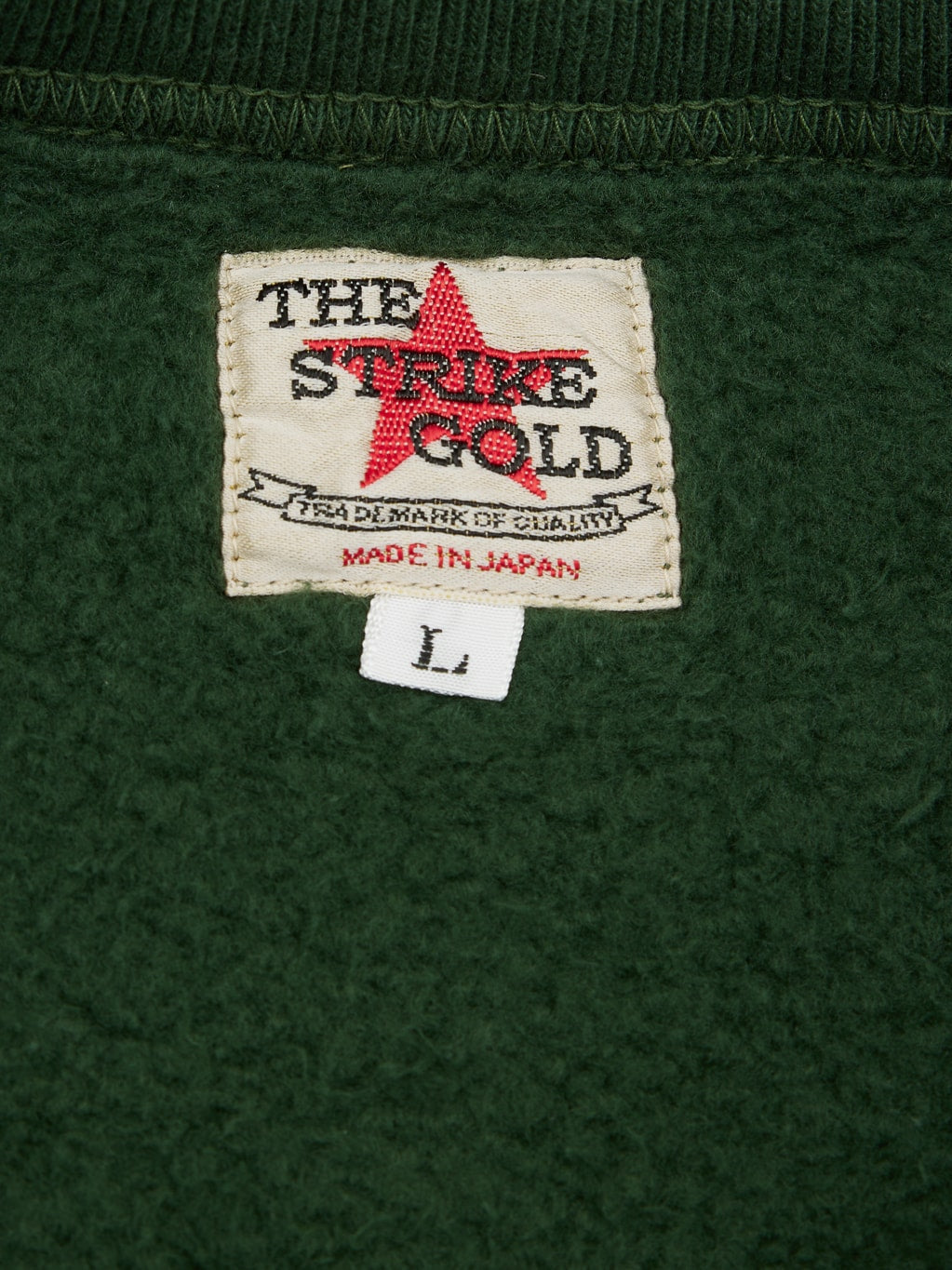 The Strike Gold Loopwheeled Sweatshirt Green interior label