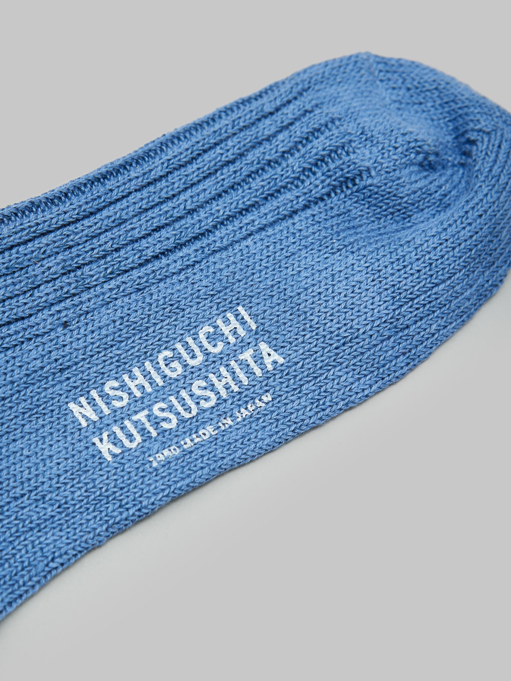 nishiguchi kutsushita linen ribbed socks blue logo