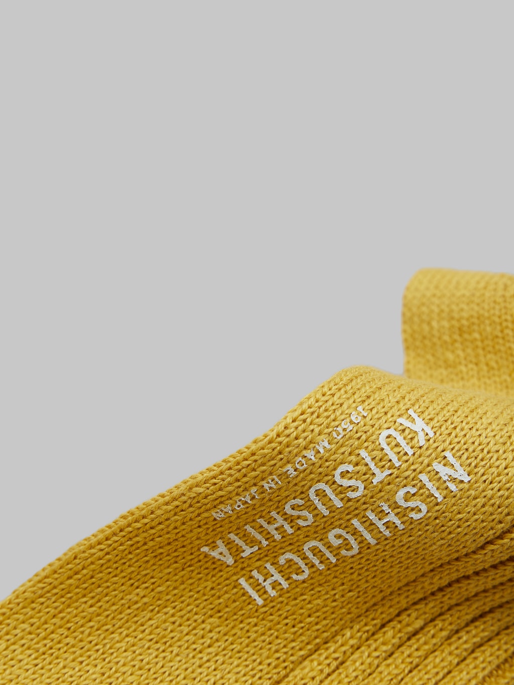 nishiguchi kutsushita linen ribbed socks canary yellow heel