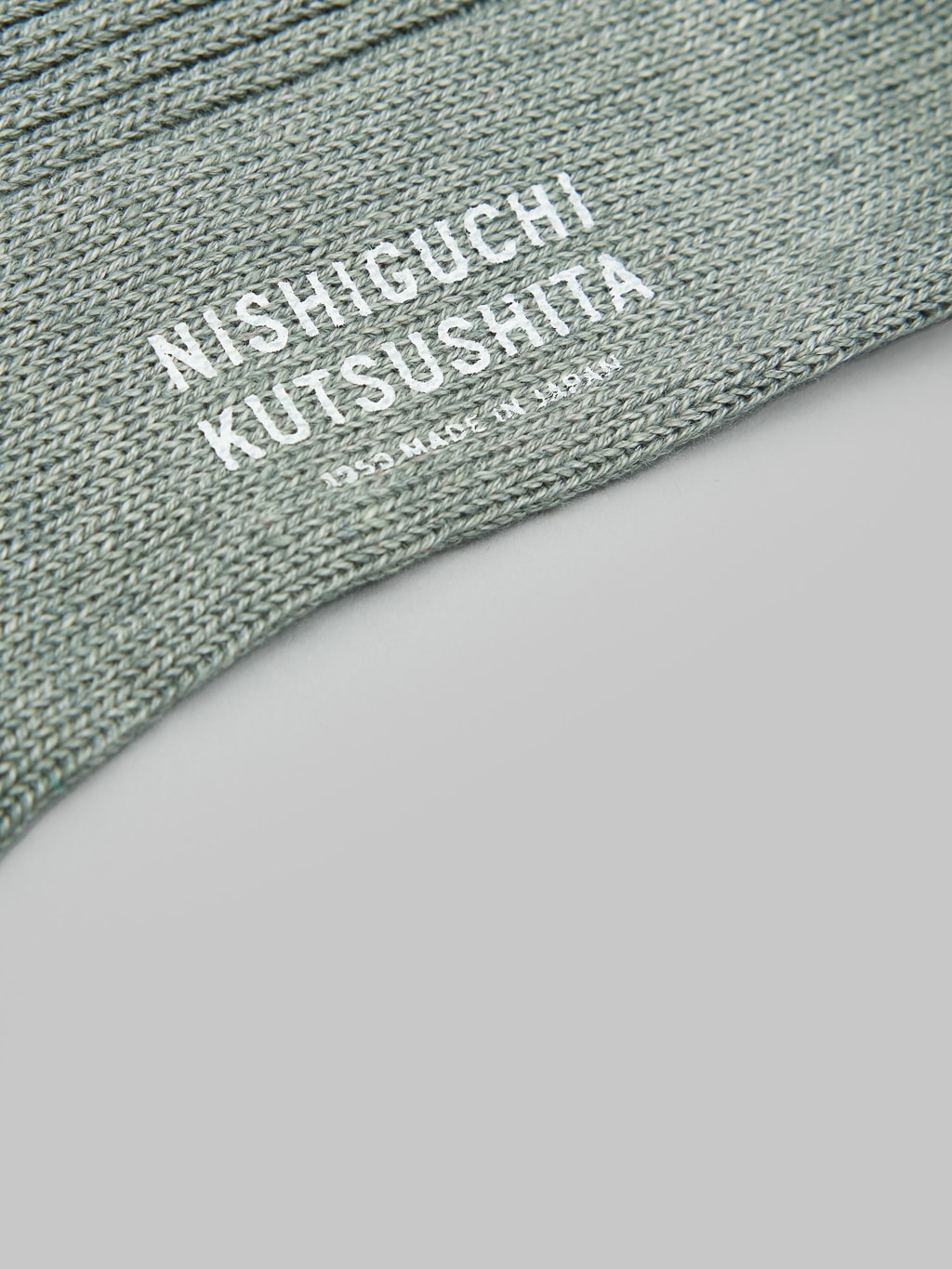 nishiguchi kutsushita linen ribbed socks sauna stone logo