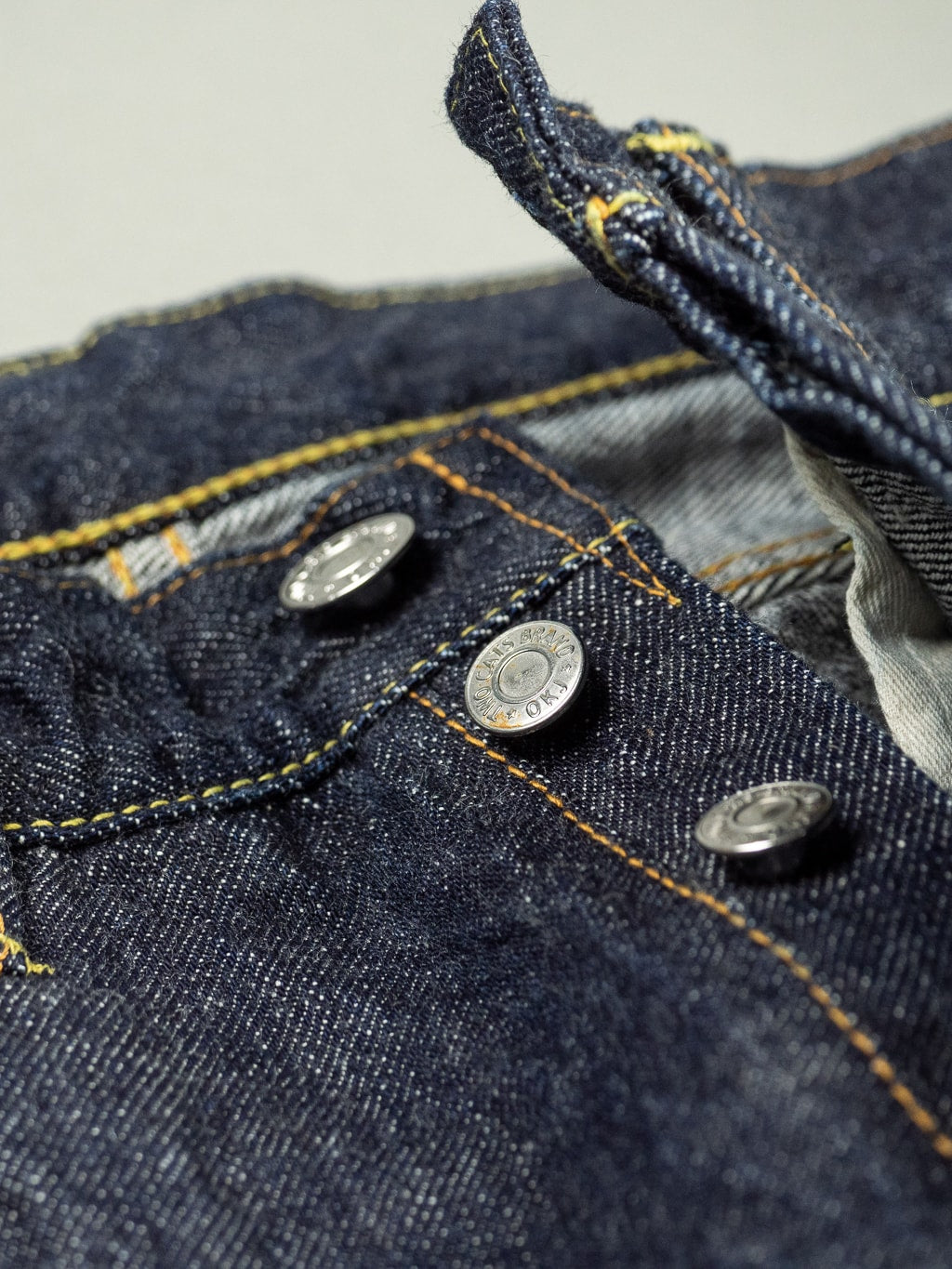 tcb 50s regular straight indigo selvedge japanese jeans buttons closeup