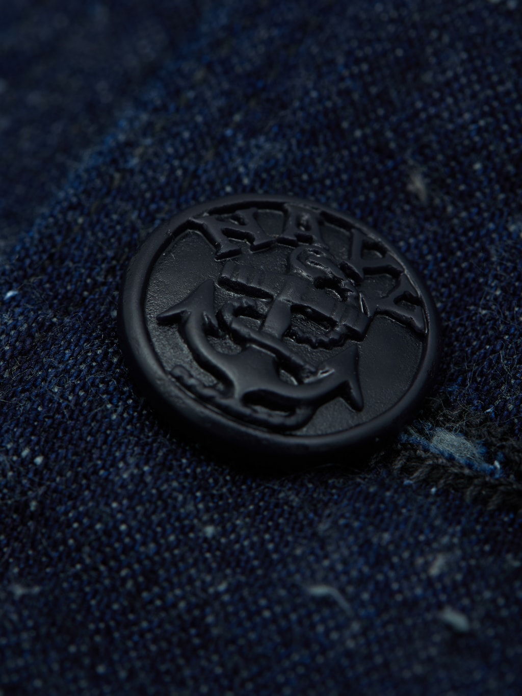 Neppy snowy sprinkles texture button closeuptcb usn vintage navy seamens jacket button closeup