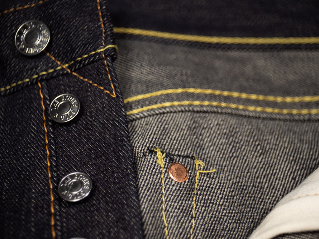 the strike gold 3109 left hand twill raw japanese jeans buttons