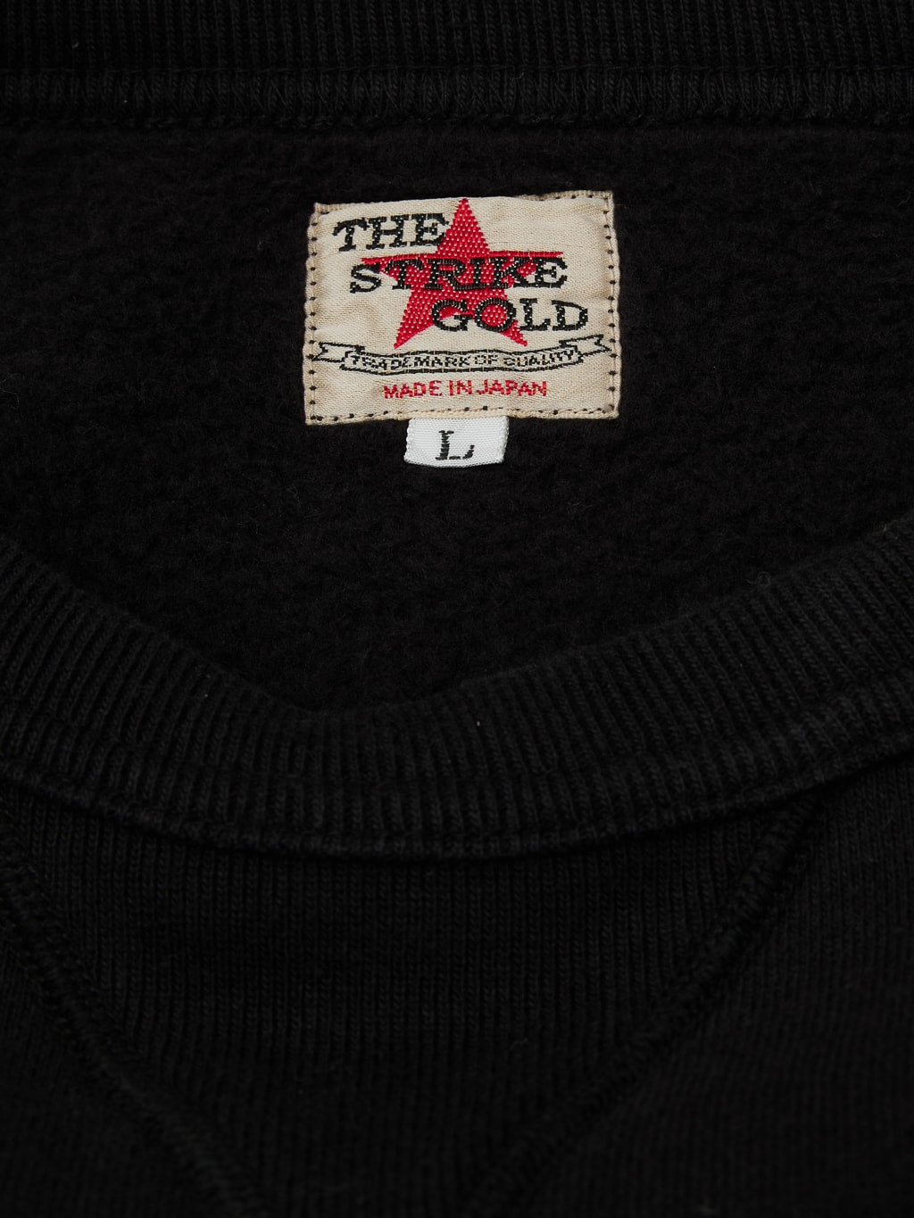 the strike gold loopwheeled sweatshirt black size label
