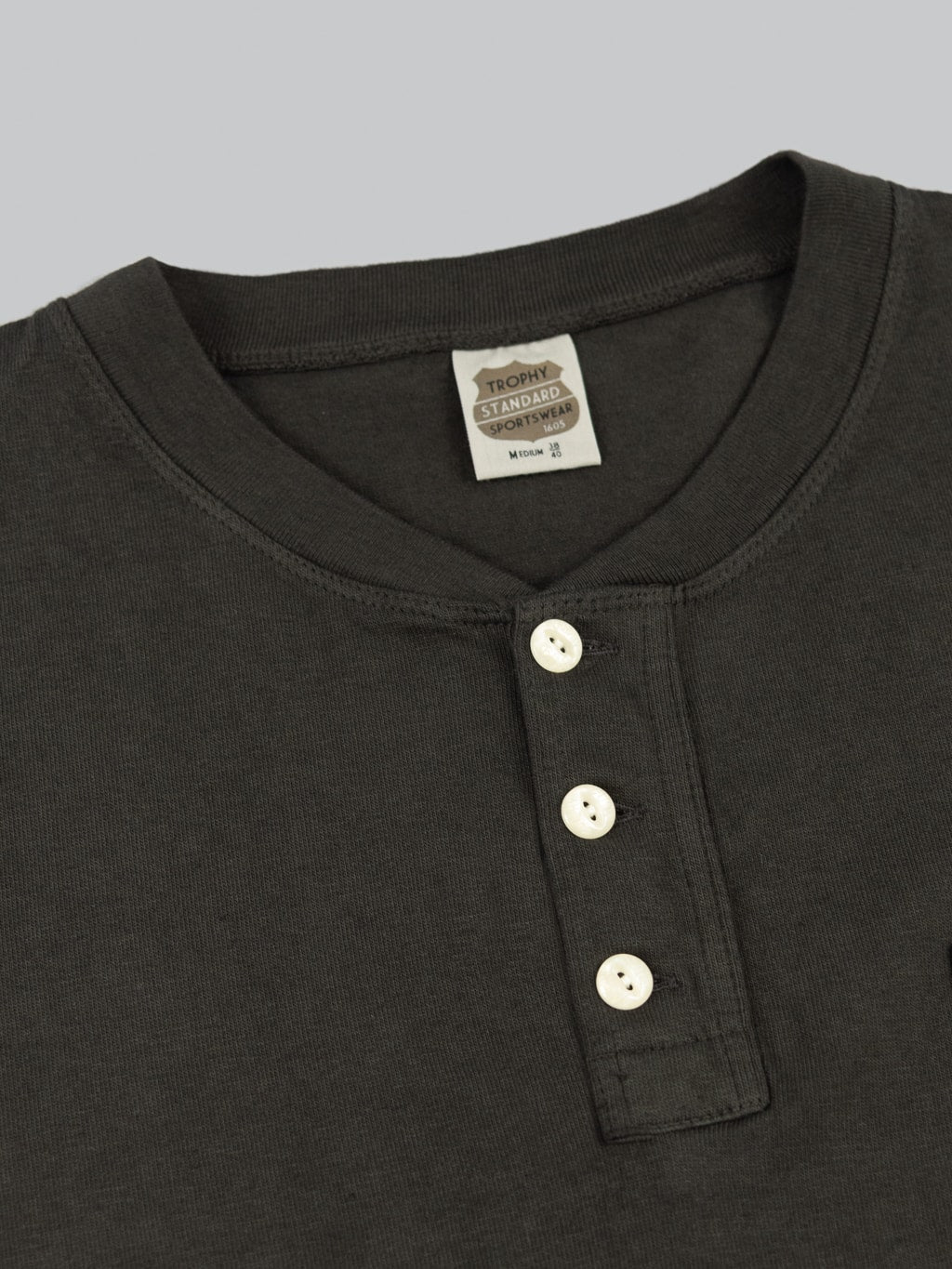 trophy clothing od henley tee black buttons