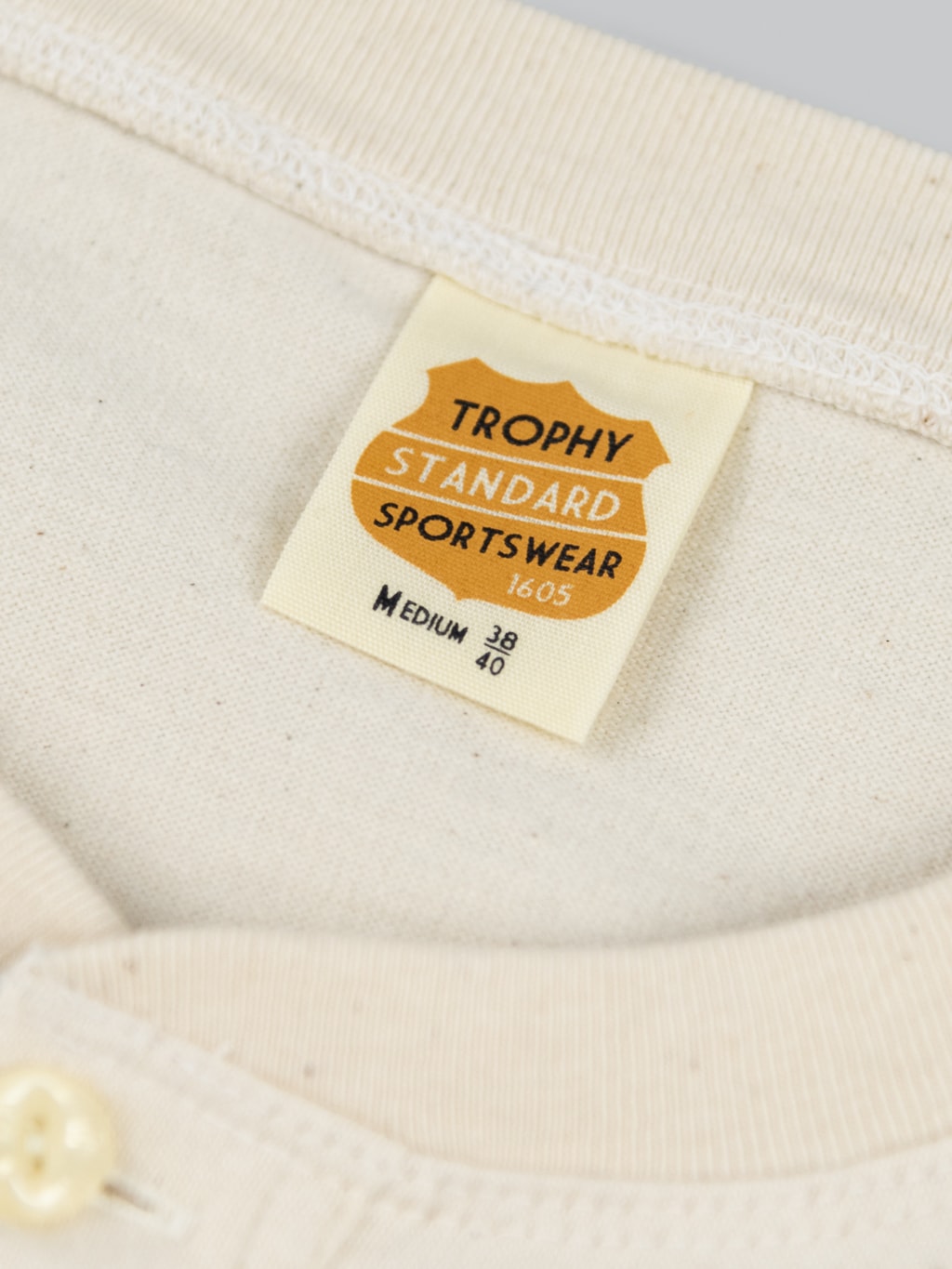 trophy clothing od henley tee natural interior tag
