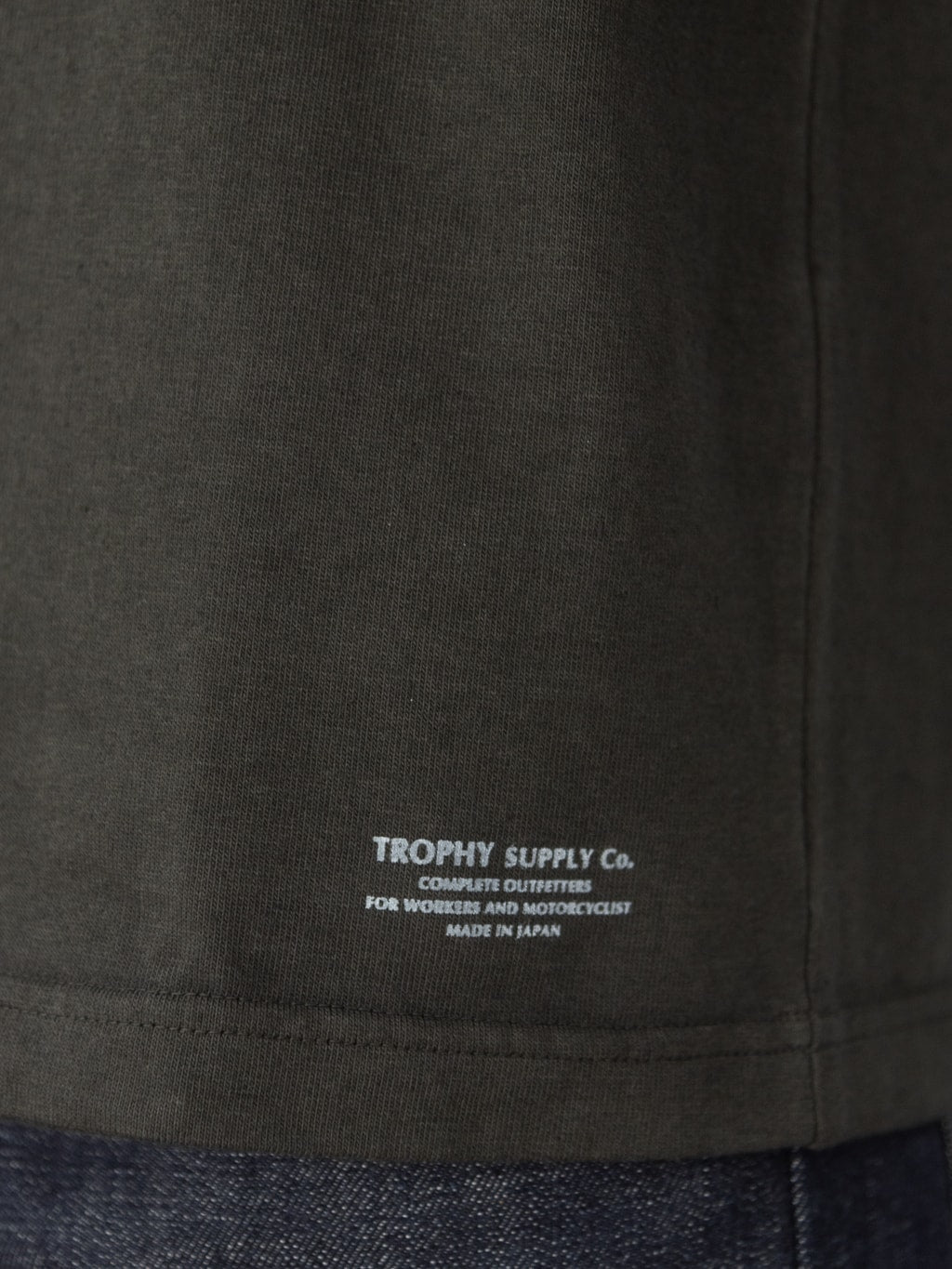 trophy clothing od pocket tee black printed branding hem